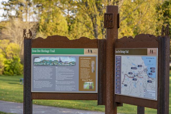 Signage with educational info and map on the Iron Ore Heritage Trail