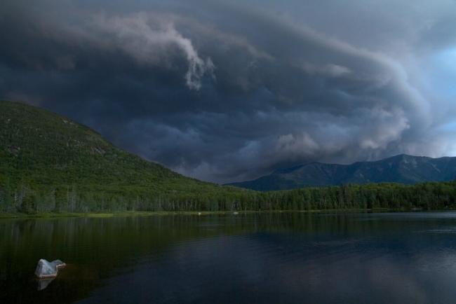 Mountain Lake with Dark Storm Clouds Moving In Overhead