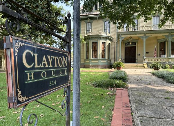 A sign in front of the mansion denotes The Clayton House, Fort Smith, Arkansas.