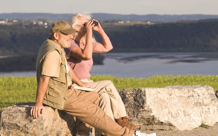 Couple With Binoculars Taking In Views of The Highpoint in York, PA