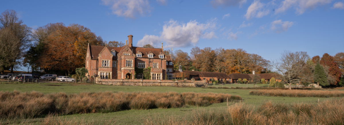 Exterior of Burley Manor Hotel in the autumn in the New Forest