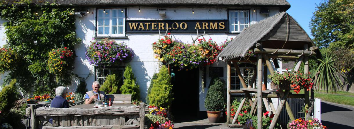 Exterior of The Waterloo Arms in Lyndhurst in the summer in the New Forest