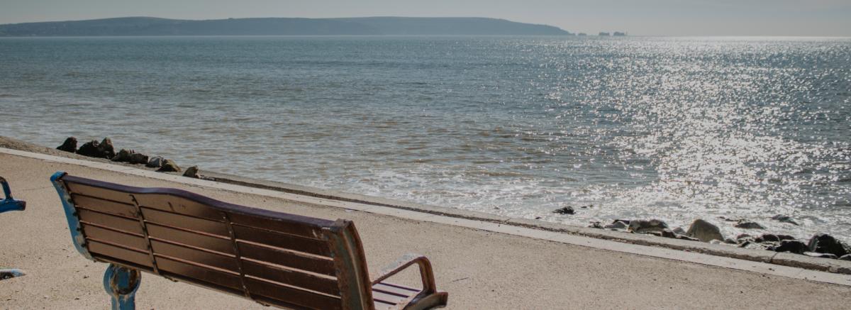 A bench at the beach at Milford on Sea in the New Forest