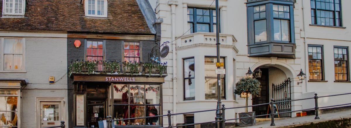 Exterior of shops and Stanwell House Hotel on Lymington high street in the New Forest
