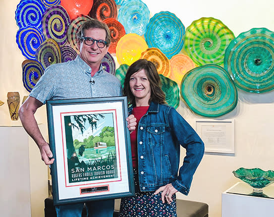 Tim de Jong with his 2021 Roger's Family Lifetime Achievement Award. Also pictured is Vanessa Horodecky.