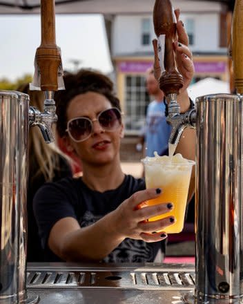 Girl tapping beer