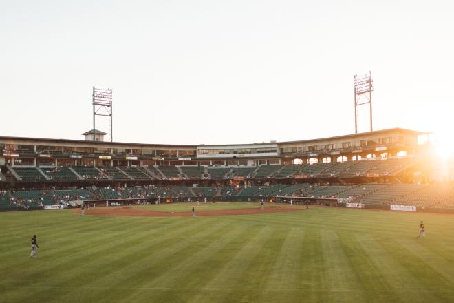 baseball fans attending game in progress