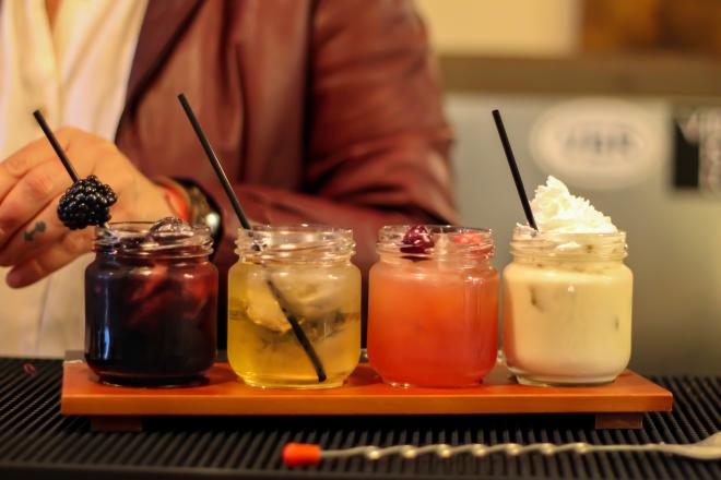 Flight of 4 different moonshine cocktails.