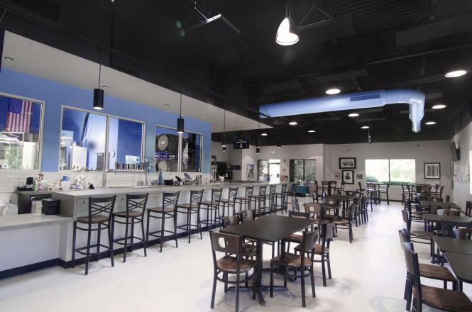 interior view of bar and tables at Pherm Brewing