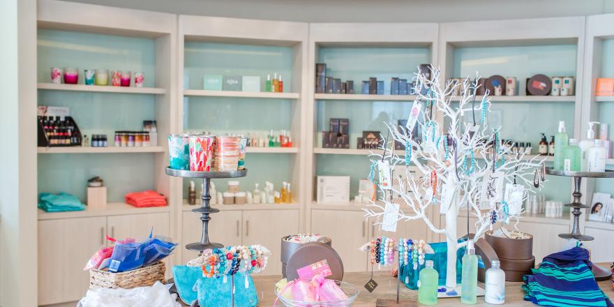 Retail shelving and table with products in Island Spa Catalina