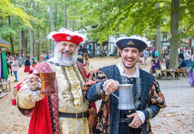 two men in Medeival garb at a renaissance festival