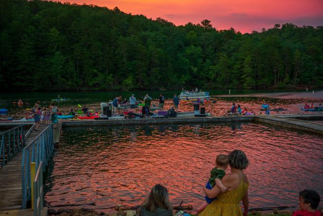 People on the dock at Philpott Lake enjoying Franklin County's Concerts by Canoe Series.