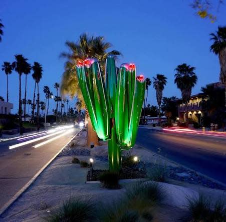 Palm Springs Pillars are an installation called Creativity by Roger Reitumann lit up at night