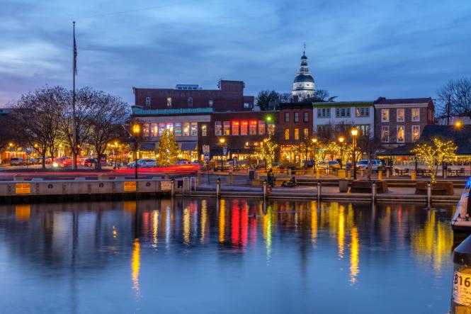 Annapolis city front with holiday lights looking from the harbor