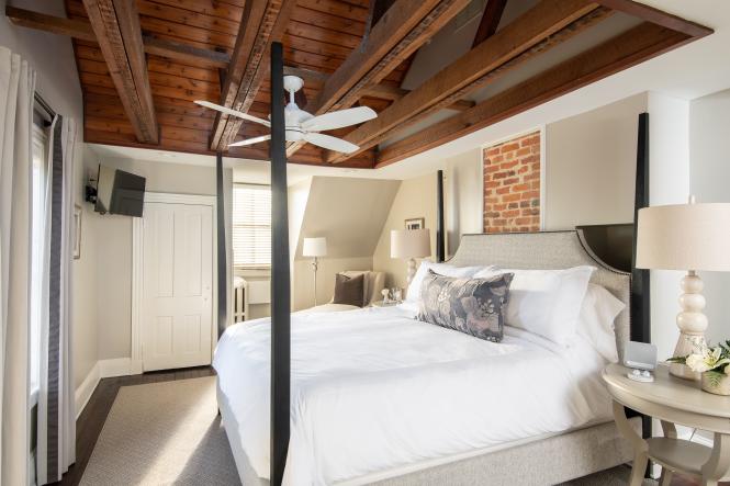 The Presidential Suite at 134 Prince has exposed beams in the ceiling