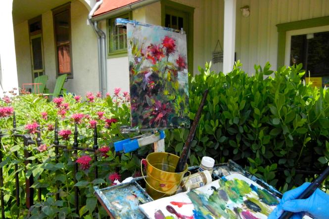 a painting of flowers and shrubs