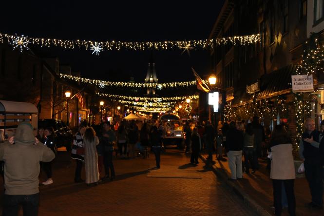The canopy of lights over West Street at night during the Chocolate Binge Festival