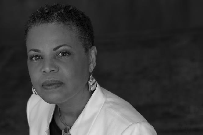 A black and white photo of an African American Woman