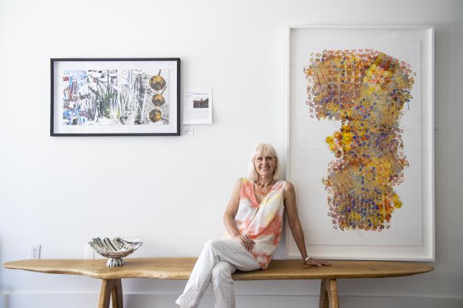 woman sitting in art gallery