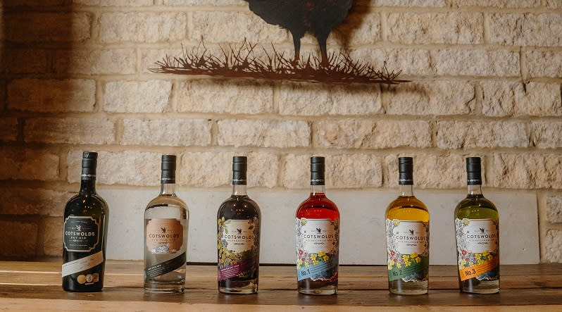 A line of Cotswold Distillery bottles of whisky