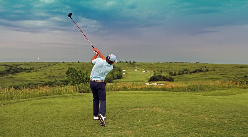 Guy playing golf at Colbert Hills