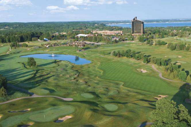 Aerial View of the Golf Courses With Tower