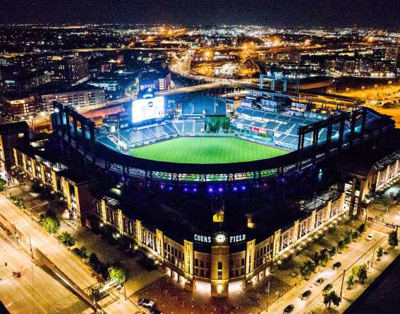 Aerial view of Coors Field at night.