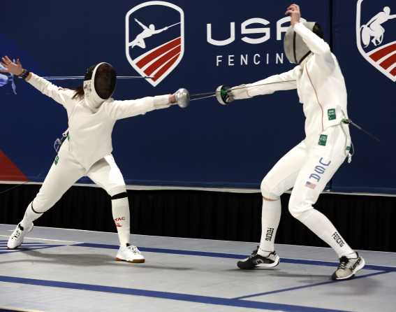 Two players compete at the USA Fencing Junior Olympics