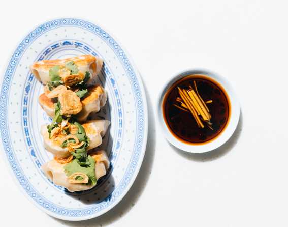 Dumplings and soup at MAKfam Asian restaurant in Denver, Colorado.