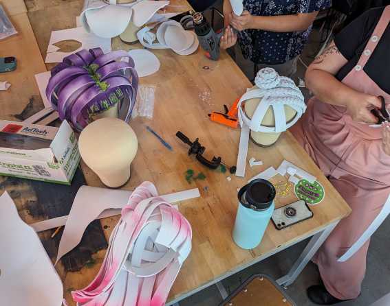 Artists turns trash into art and fashion at Meow Wolf Denver