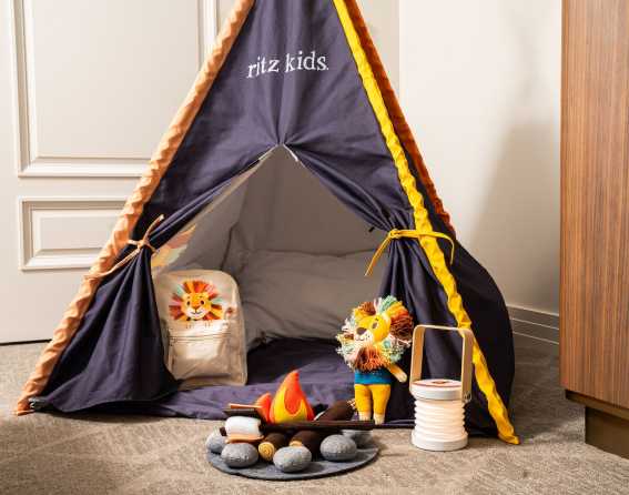 A kids teepee with toys at The Ritz-Carlton, Denver.