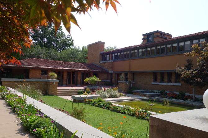 View of lawn and exterior at Frank Lloyd Wright's Allen House in Wichita, KS