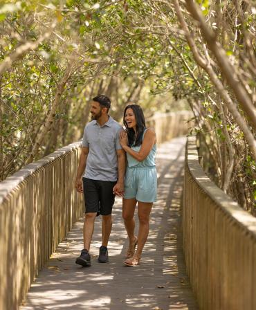 Couple enjoying Peace River Botanical & Sculpture Gardens in Punta Gorda/Englewood Beach