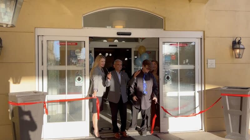 Officials cut the ribbon at La Quinta Inn & Suites by Wyndham-Albuquerque Midtown to celebrate new completed renovations