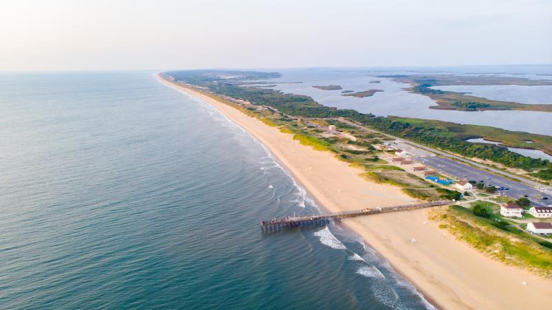 aerial of beach with jetty