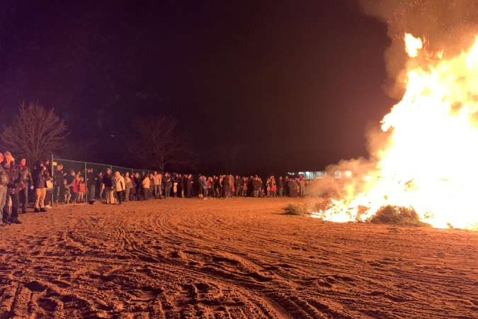 2020 Twelfth Night Tree Bonfire Event With Crowd Surrounding Fire