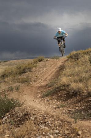 Cresting the hill mountain biking Pilot Hill outside Laramie, Wyoming