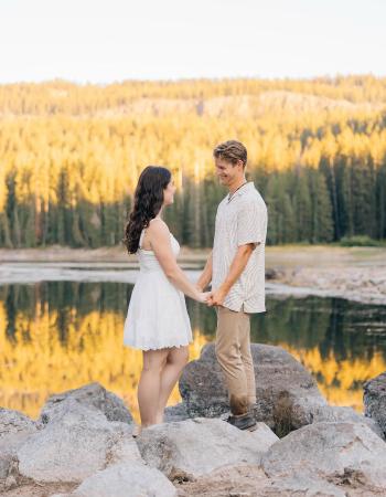 Couple Posing in front of Lake on Grand Mesa