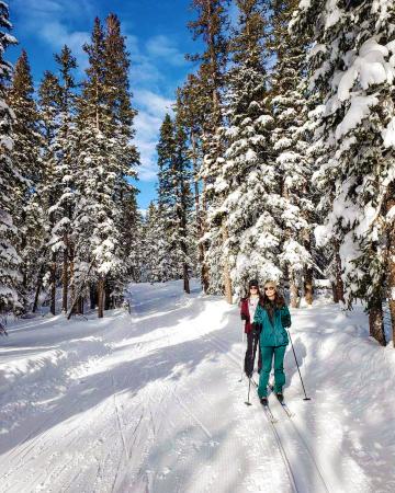 Two Women Skiing on the Grand Mesa