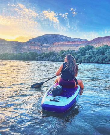 Woman Sitting on a Paddleboard