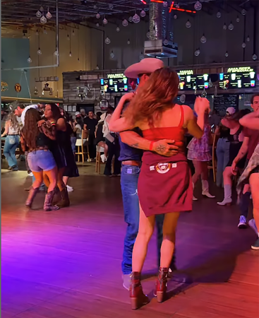 Two people dancing at Mama Ree's Cowboy Bar