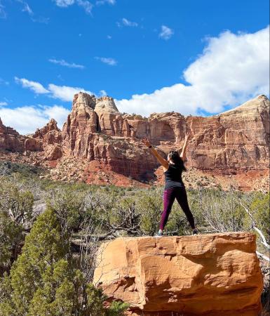 Woman Posing in front of Colorado National Monument