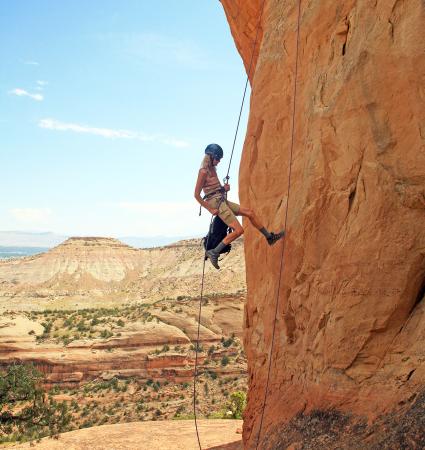 Person Rock Climbing