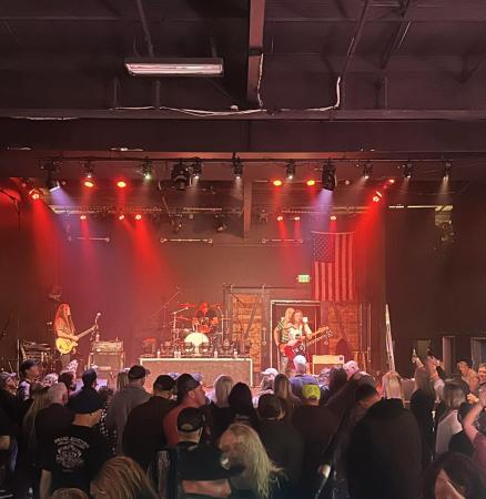 Warehouse2565 Stage with Performers and an Audience