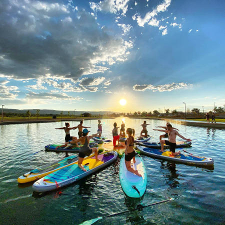 Grand Junction Adventures Leading a SUP Yoga Session