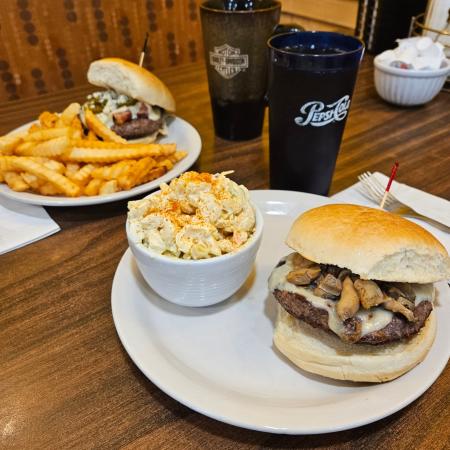 A mushroom swiss burger with macaroni salad and fries at Tucci’s Family Diner.