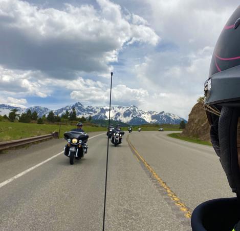 Picture of People Riding Motorcycles Through the Mountains