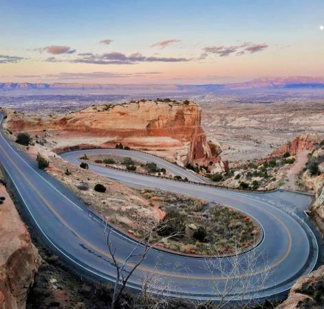 View of Rim Rock Drive with Sunset in the Sky