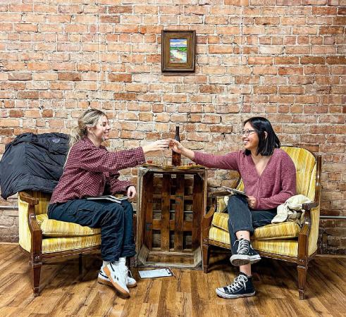 Two Girls Drinking Wine at Carlson Vineyards Downtown Tasting Room