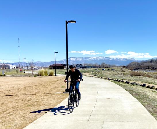 Person Riding on Colorado Riverfront Trail